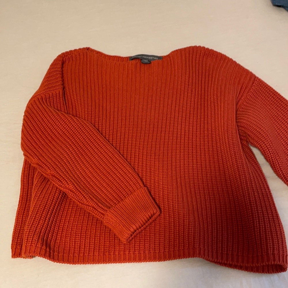 French connection thick orange sweater in size xs.